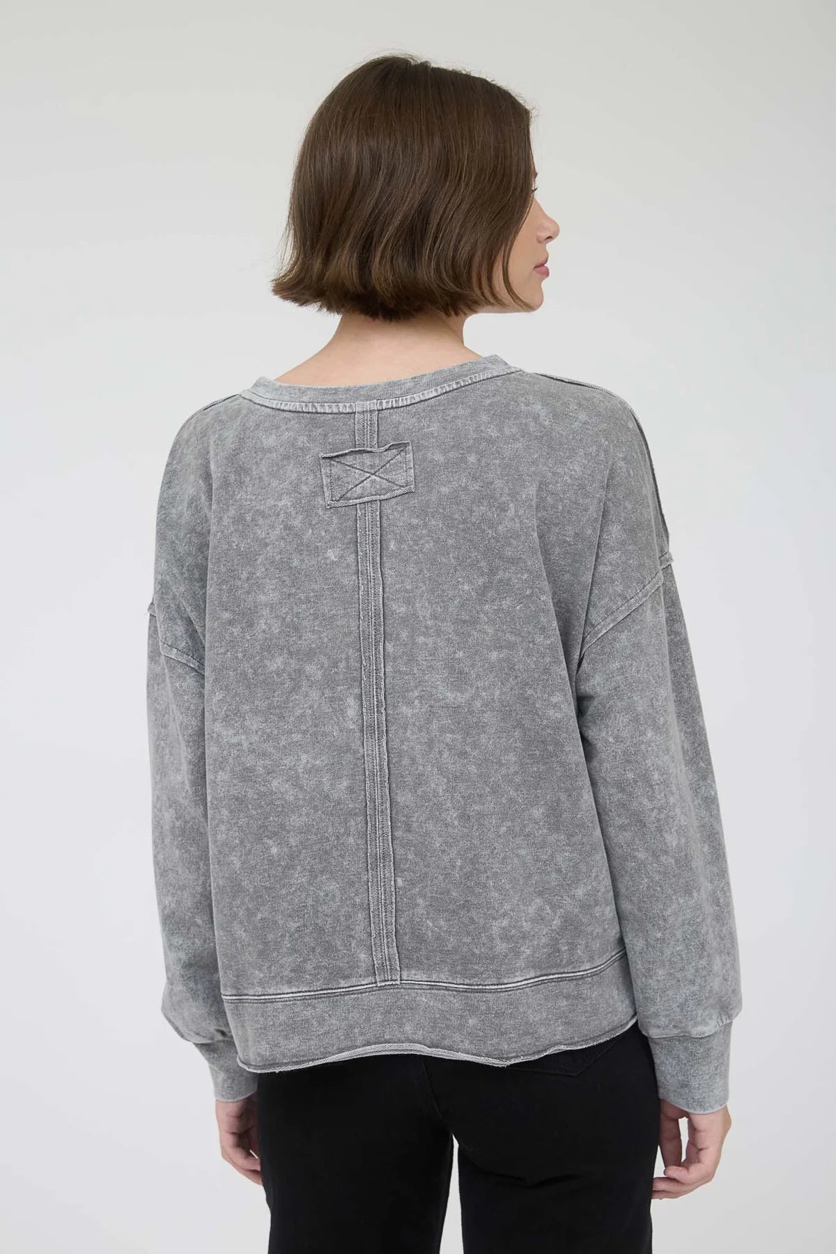 Washed Exposed Seam Long Sleeve Knit Top