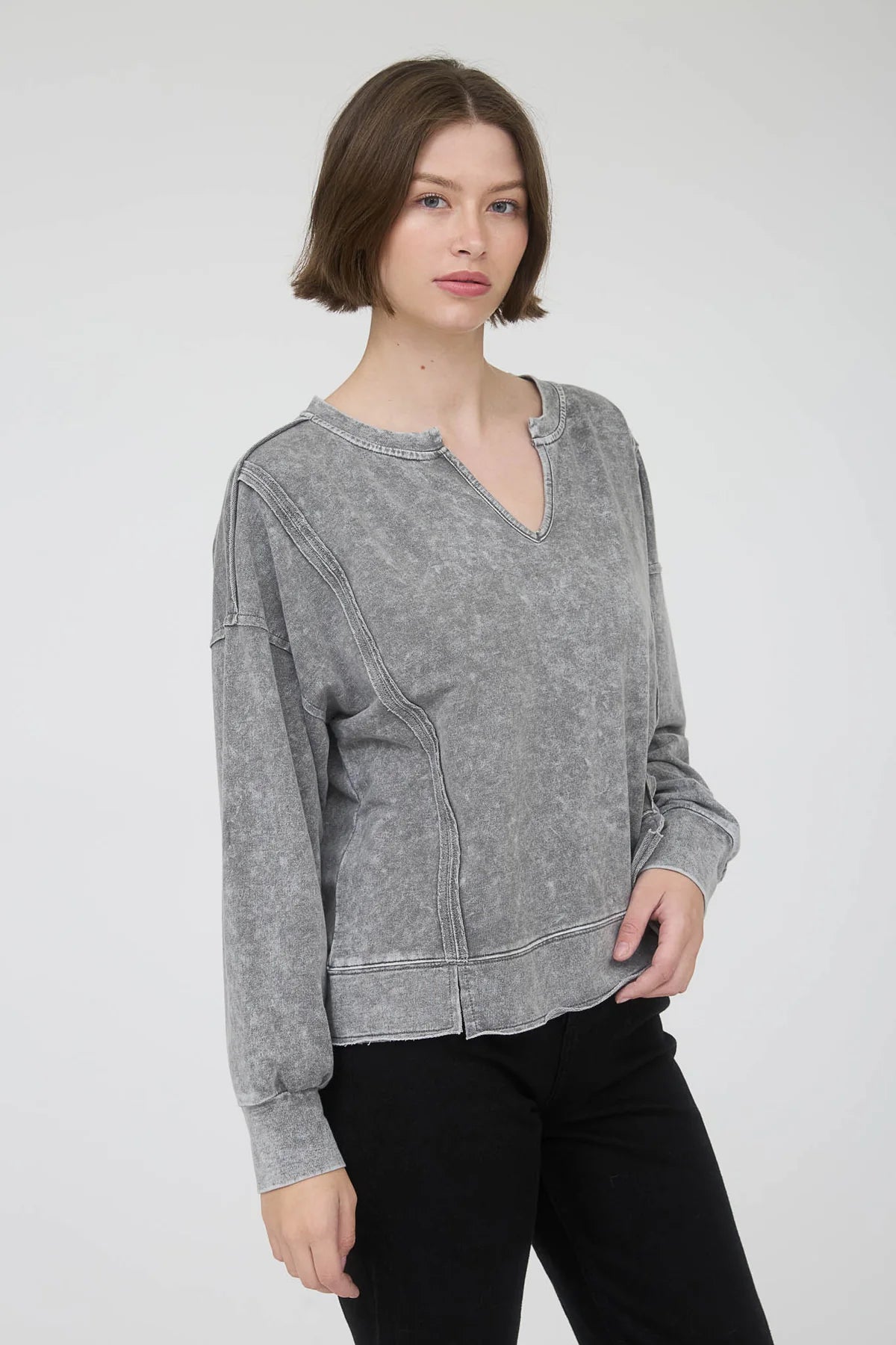 Washed Exposed Seam Long Sleeve Knit Top