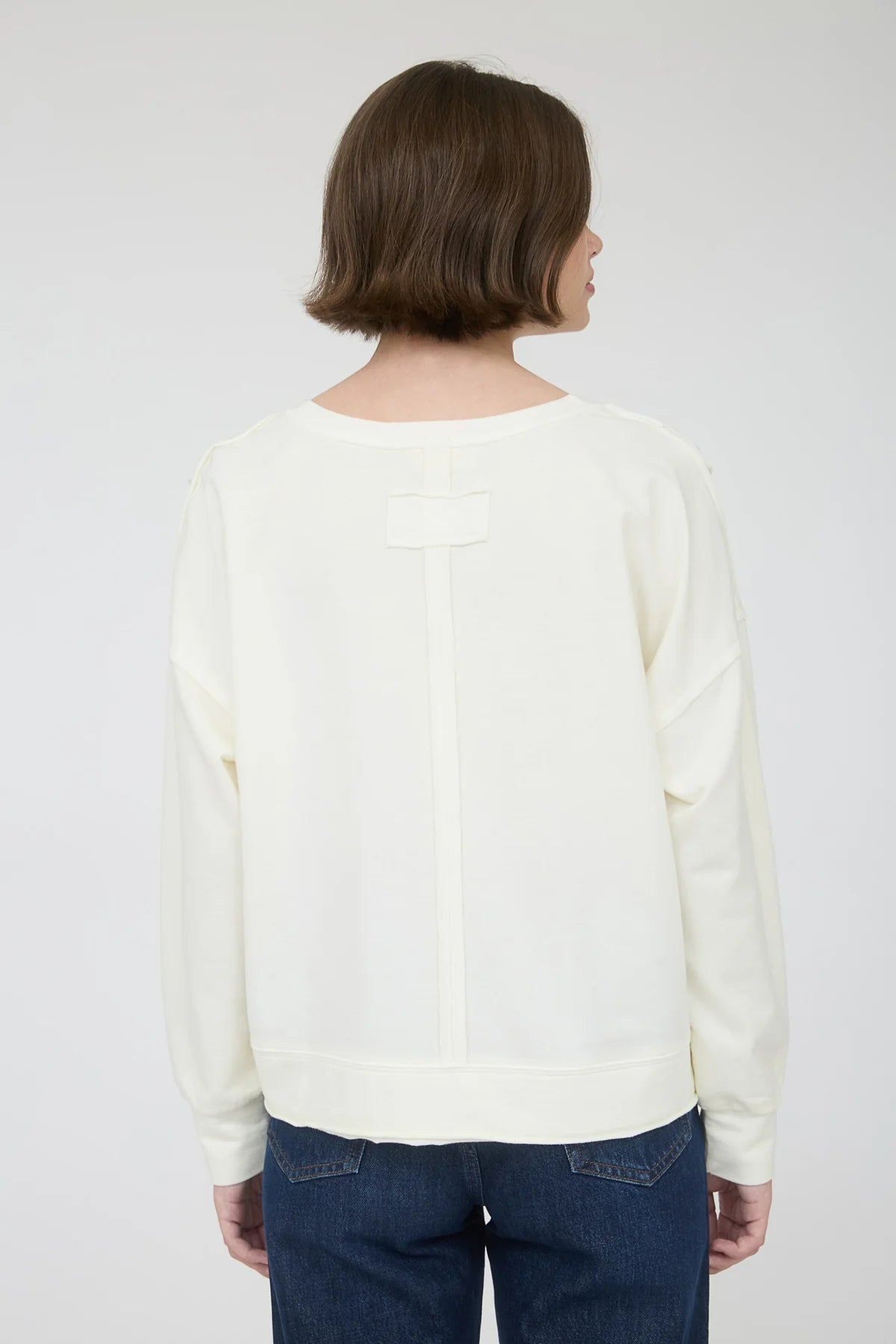 Washed Exposed Seam Long Sleeve Knit Top