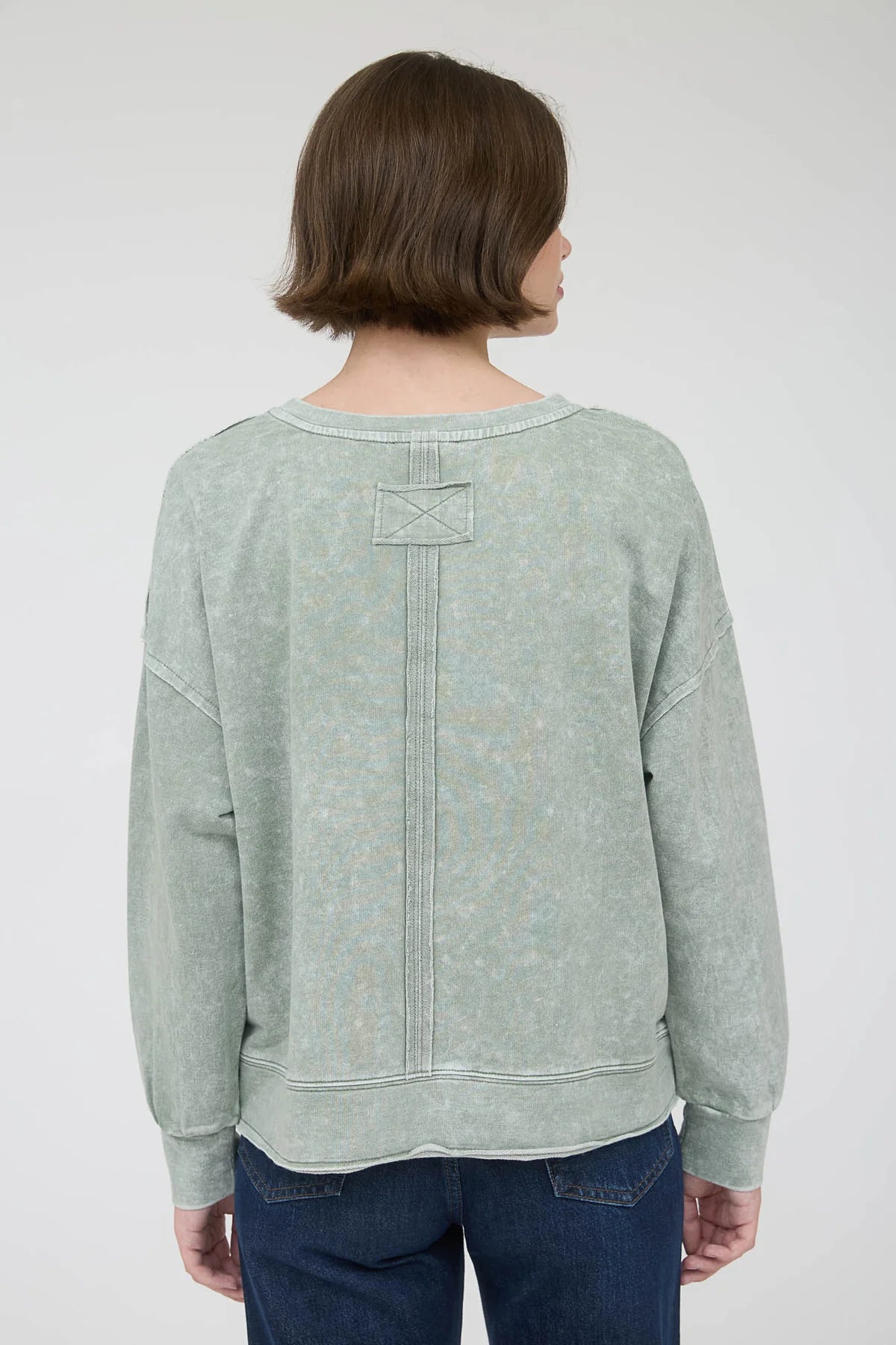 Washed Exposed Seam Long Sleeve Knit Top