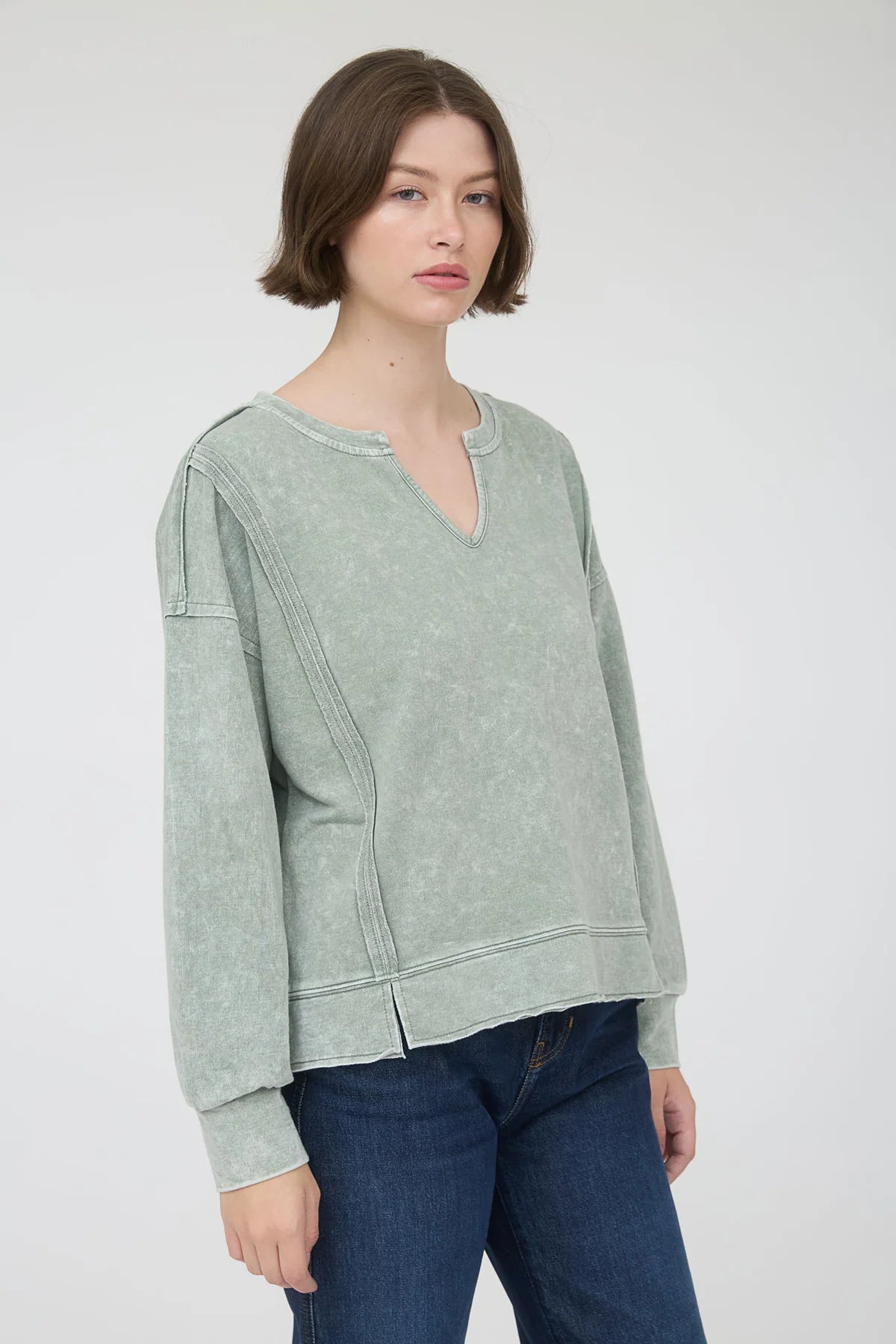 Washed Exposed Seam Long Sleeve Knit Top