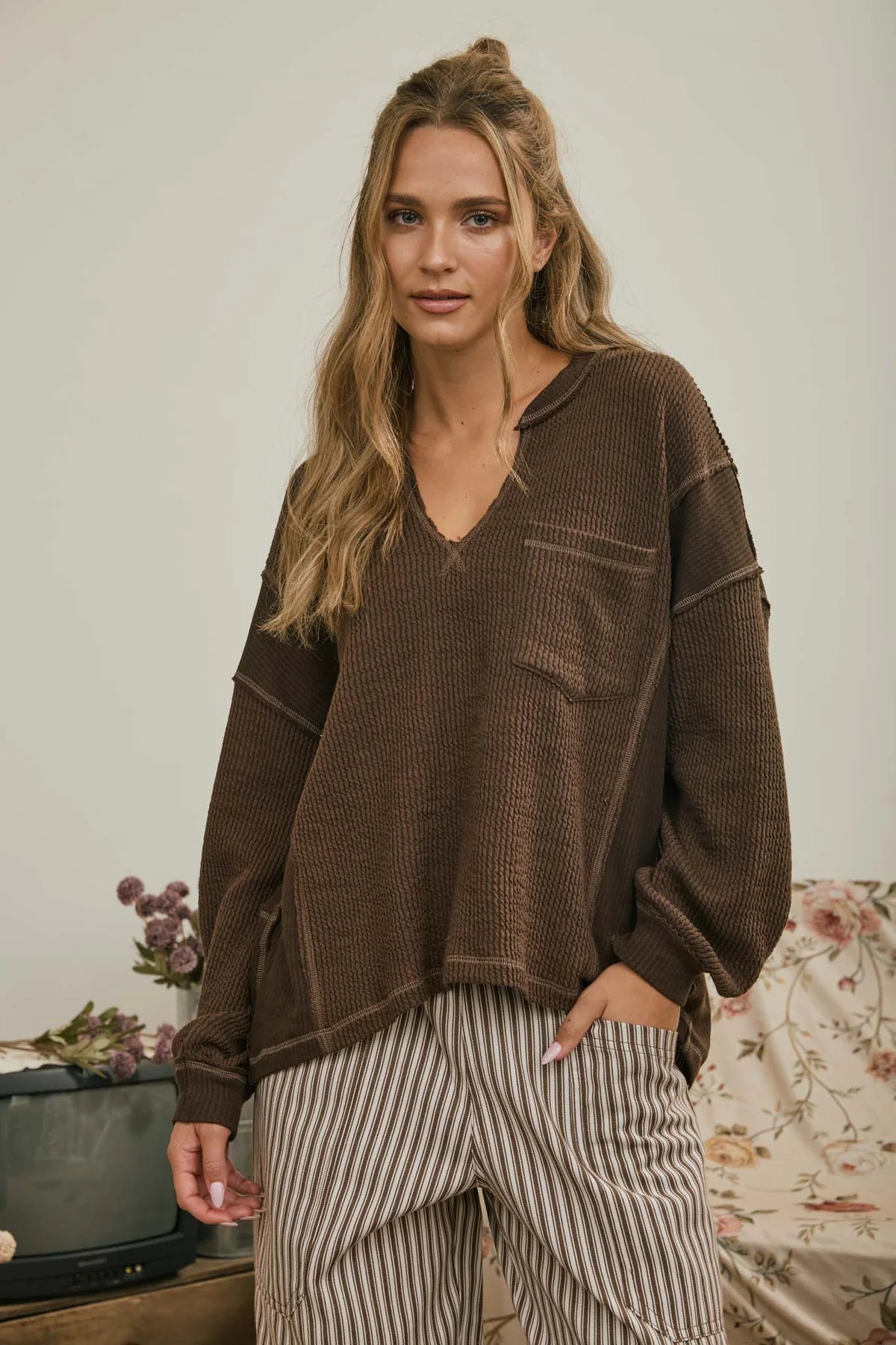Split Neck Raw Edge Long Sleeve Ribbed Knit Top