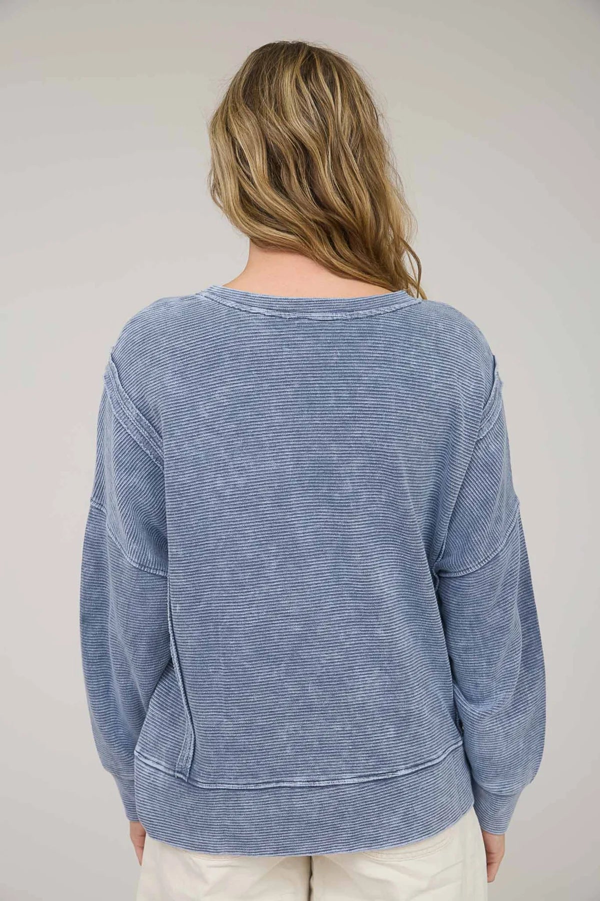Washed Exposed Seam Side Slit Long Sleeve Knit Top