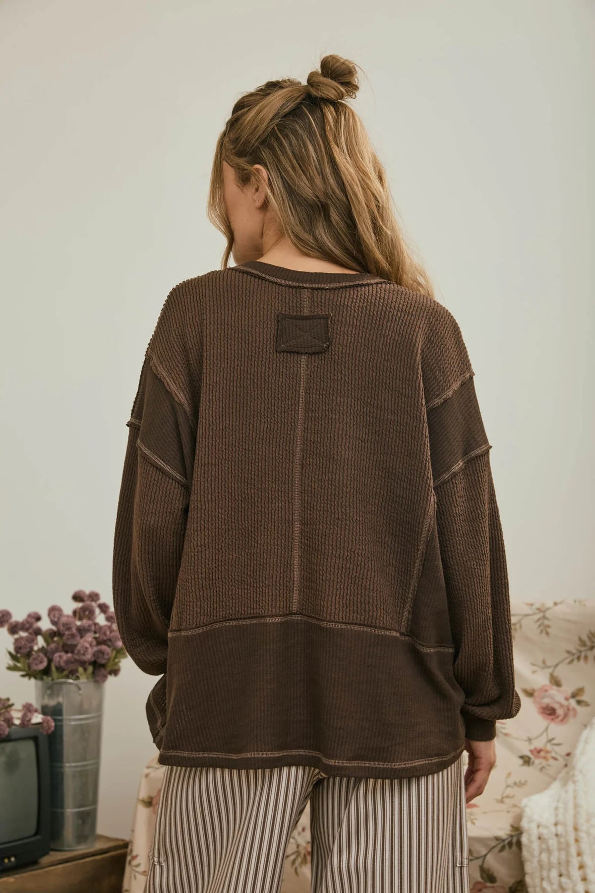 Split Neck Raw Edge Long Sleeve Ribbed Knit Top